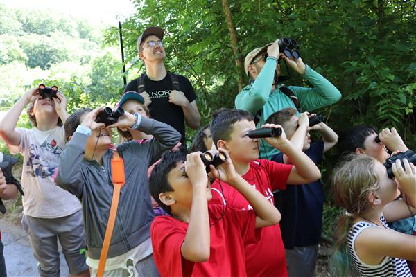 students outside in Bird Discovery summer learning class