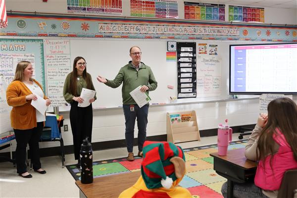 adults leading personal finance presentation